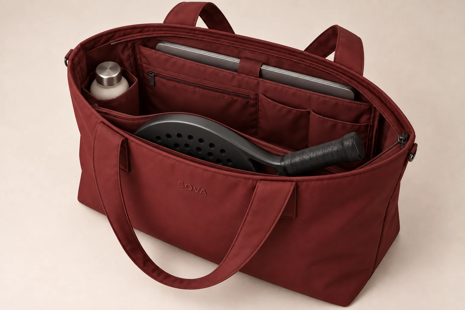 Concept view of a racket partially inserted into SOVA’s dedicated concealed front-wall compartment